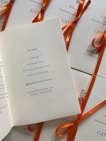 Inside page of cathedral wedding order of service showing elegant typography